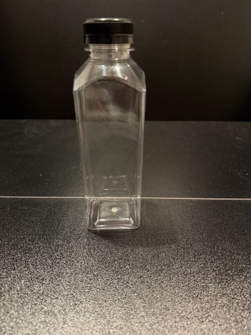 Never Been Open 40 Clear Plastic Square Bottle with Black Screw Cap